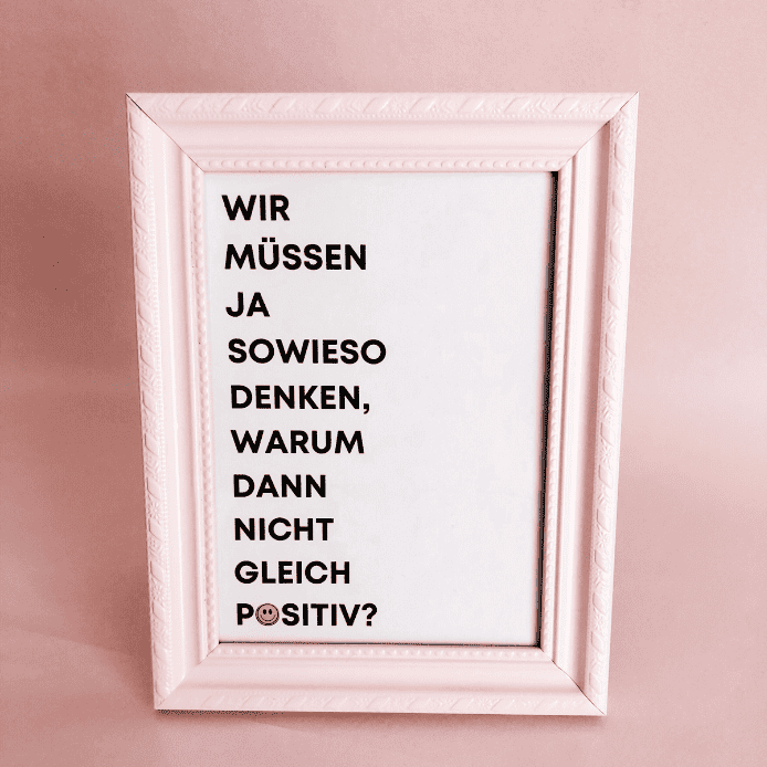 Selbst gestalteter Bilderrahmen mit persönlichem Spruch